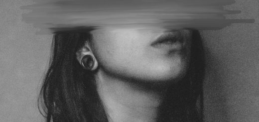 Artistic black and white portrait with blurred face evokes anonymity and emotion.